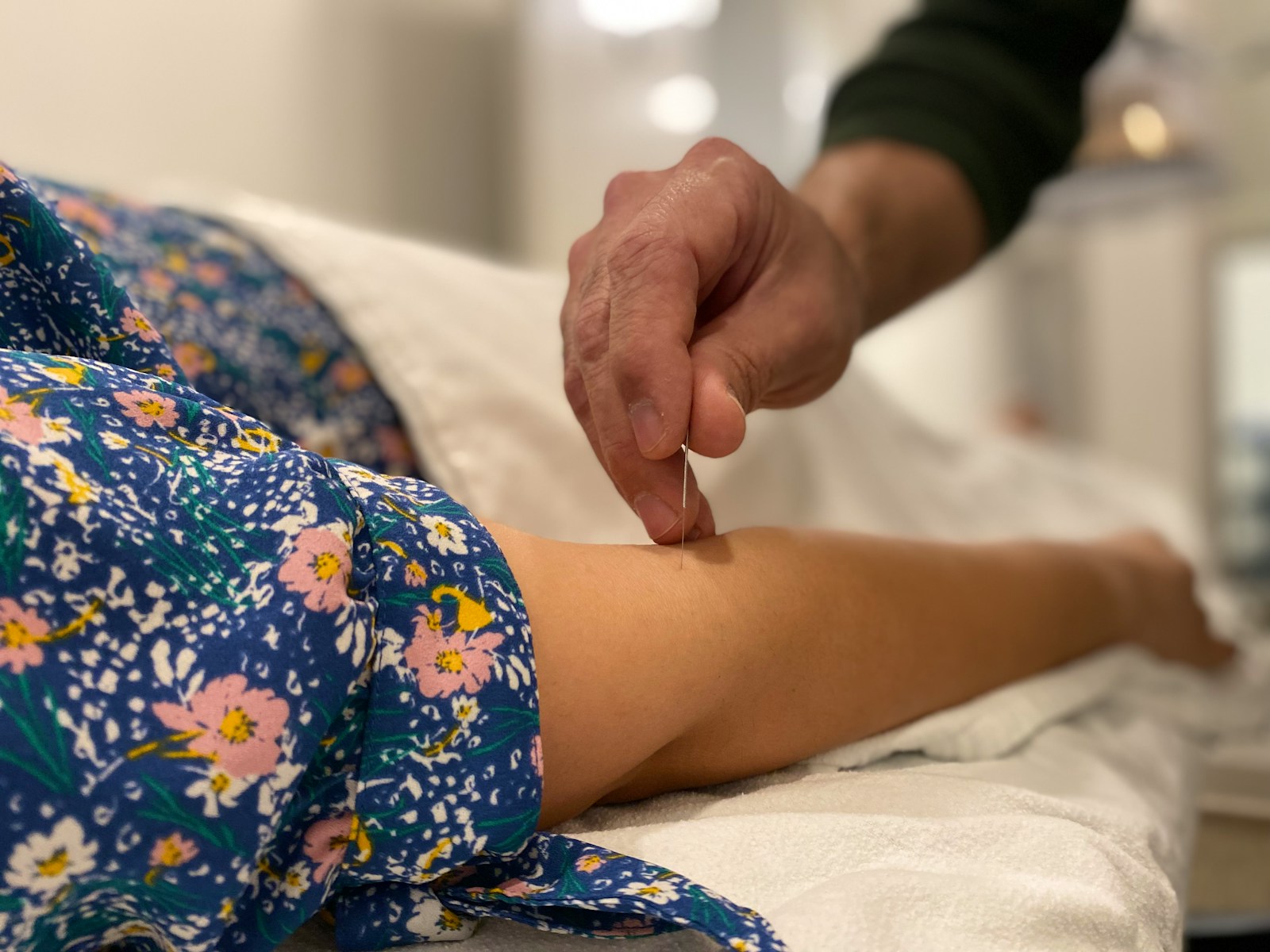 a person getting a foot massage in a room
